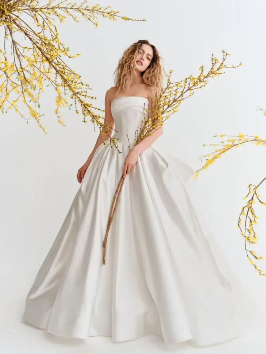 full front of alyne reeve mikado ball gown wedding dress with a strapless neckline and basque waist