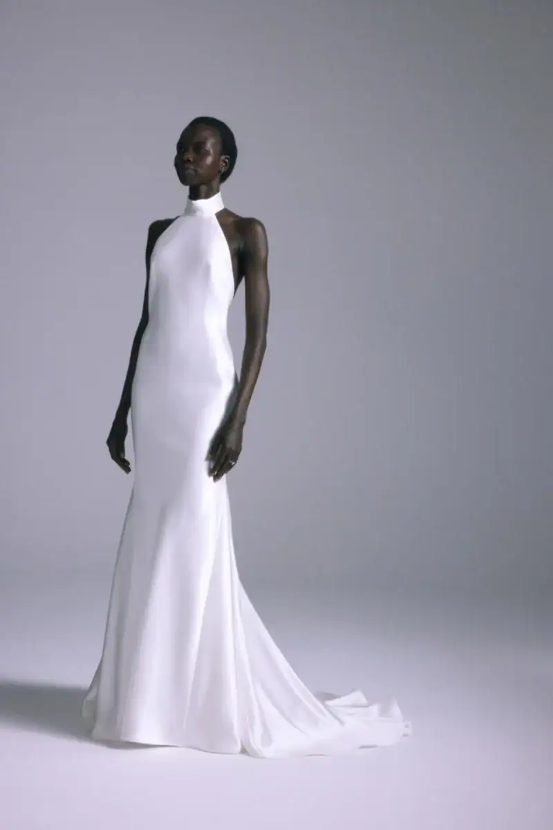 full front of amsale mirai silky fitted wedding dress with a halter neckline and chapel length train