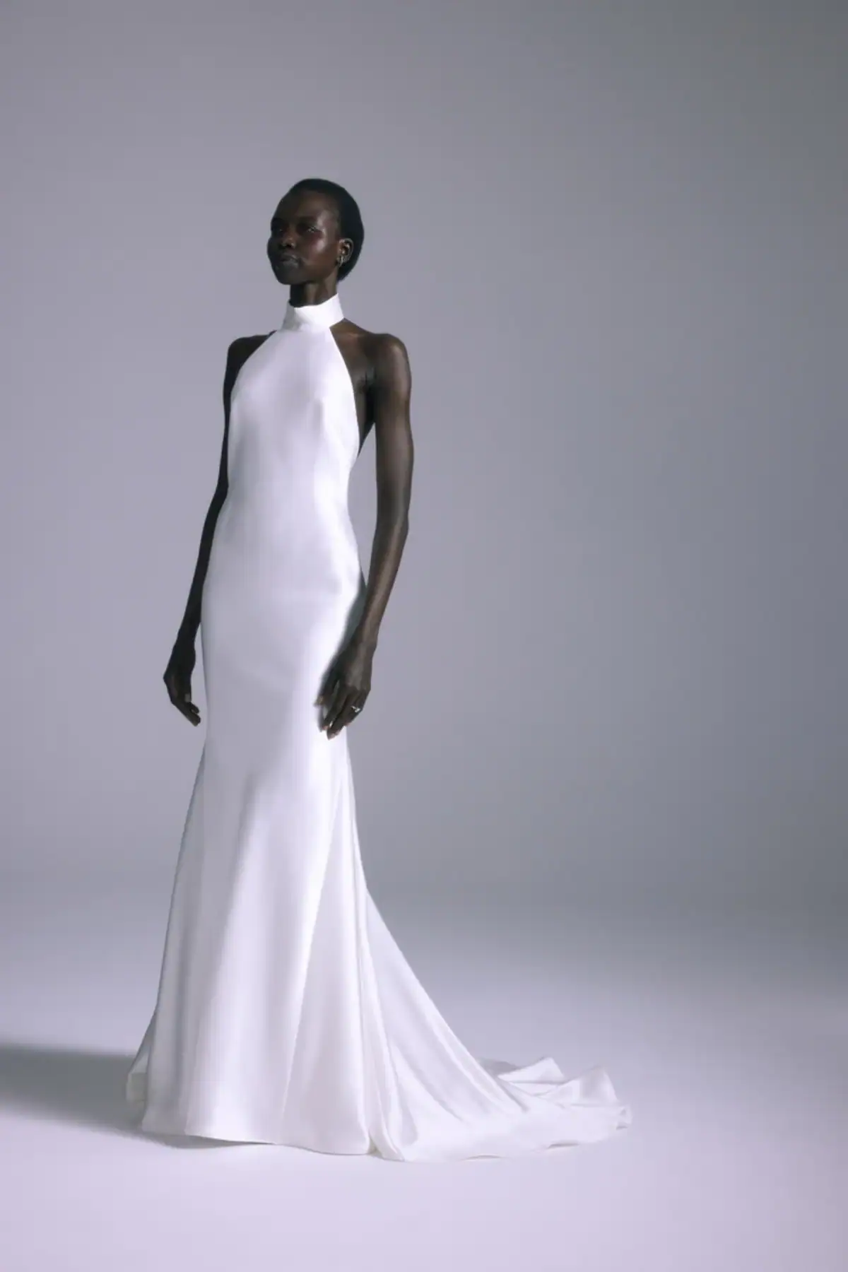 full front of amsale mirai silky fitted wedding dress with a halter neckline and chapel length train
