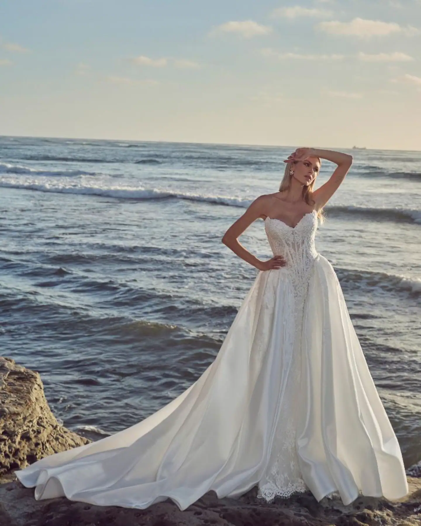 full front of calla blanche augusta ivory lace fitted wedding dress with matching satin overskirt