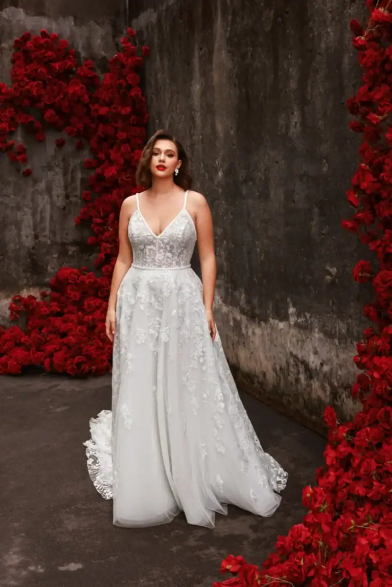 Tulle A-line wedding dress with scattered lace appliques and thin straps