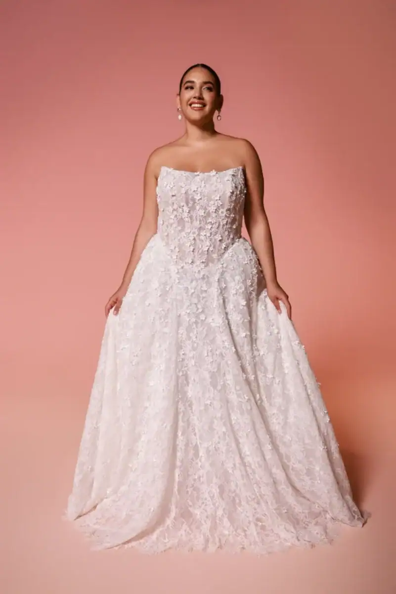 dany girl plus size wedding dress with basque waist and strapless scoop neckline