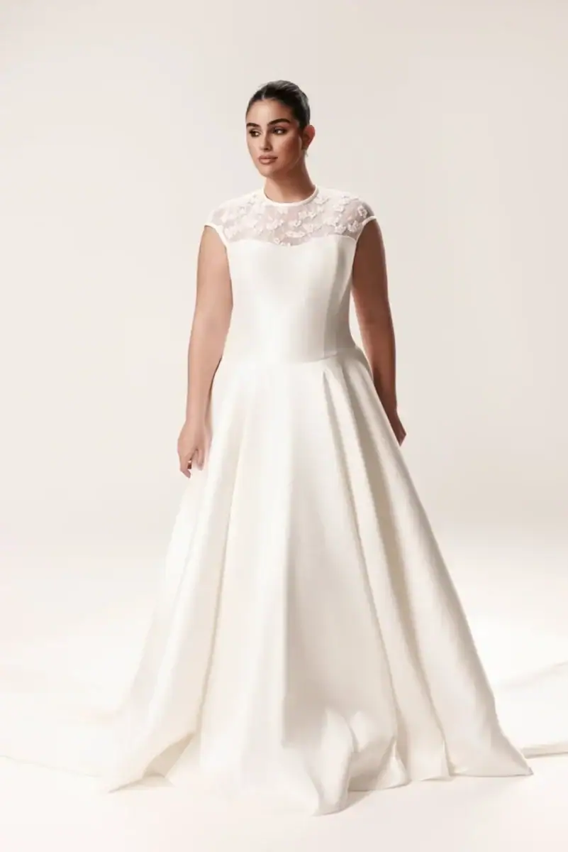 modest a-line wedding dress with lace details on bodice