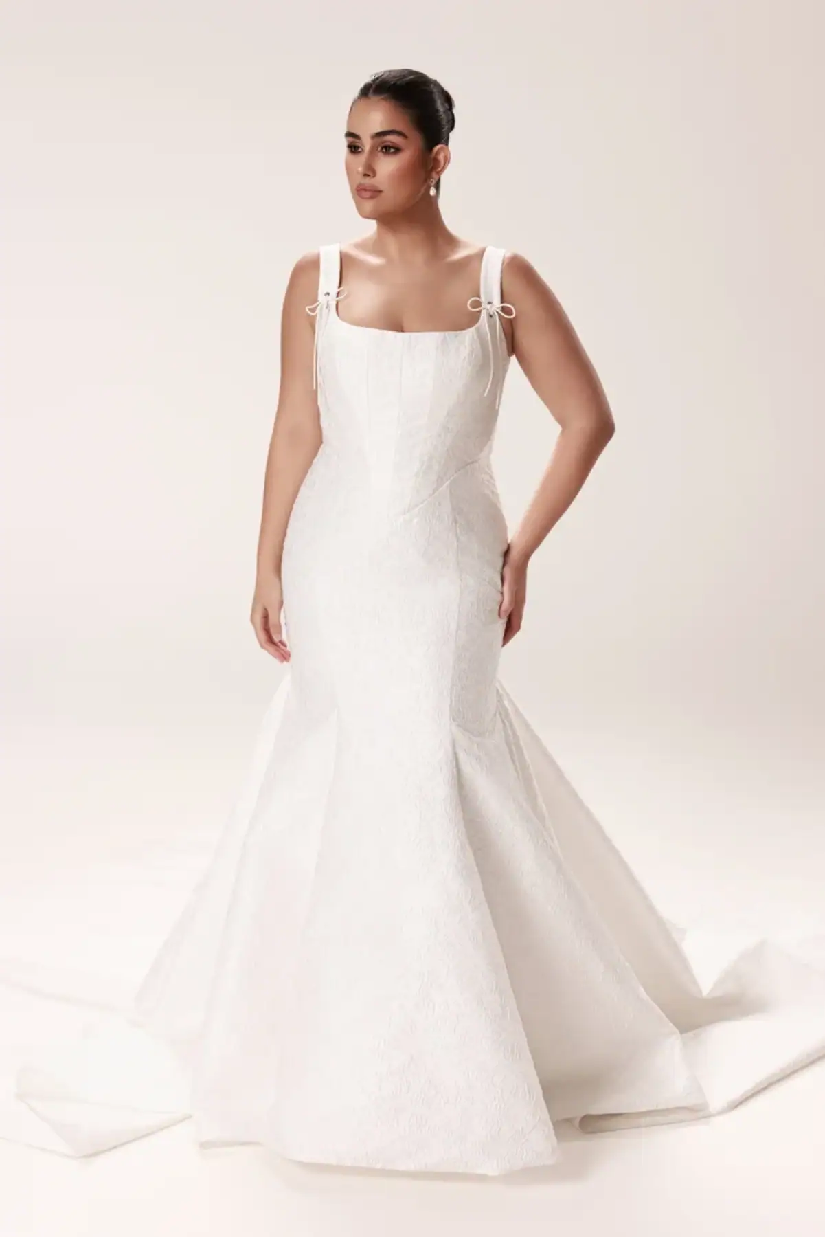 printed fit n flare wedding dress with basque waist and bows on the straps