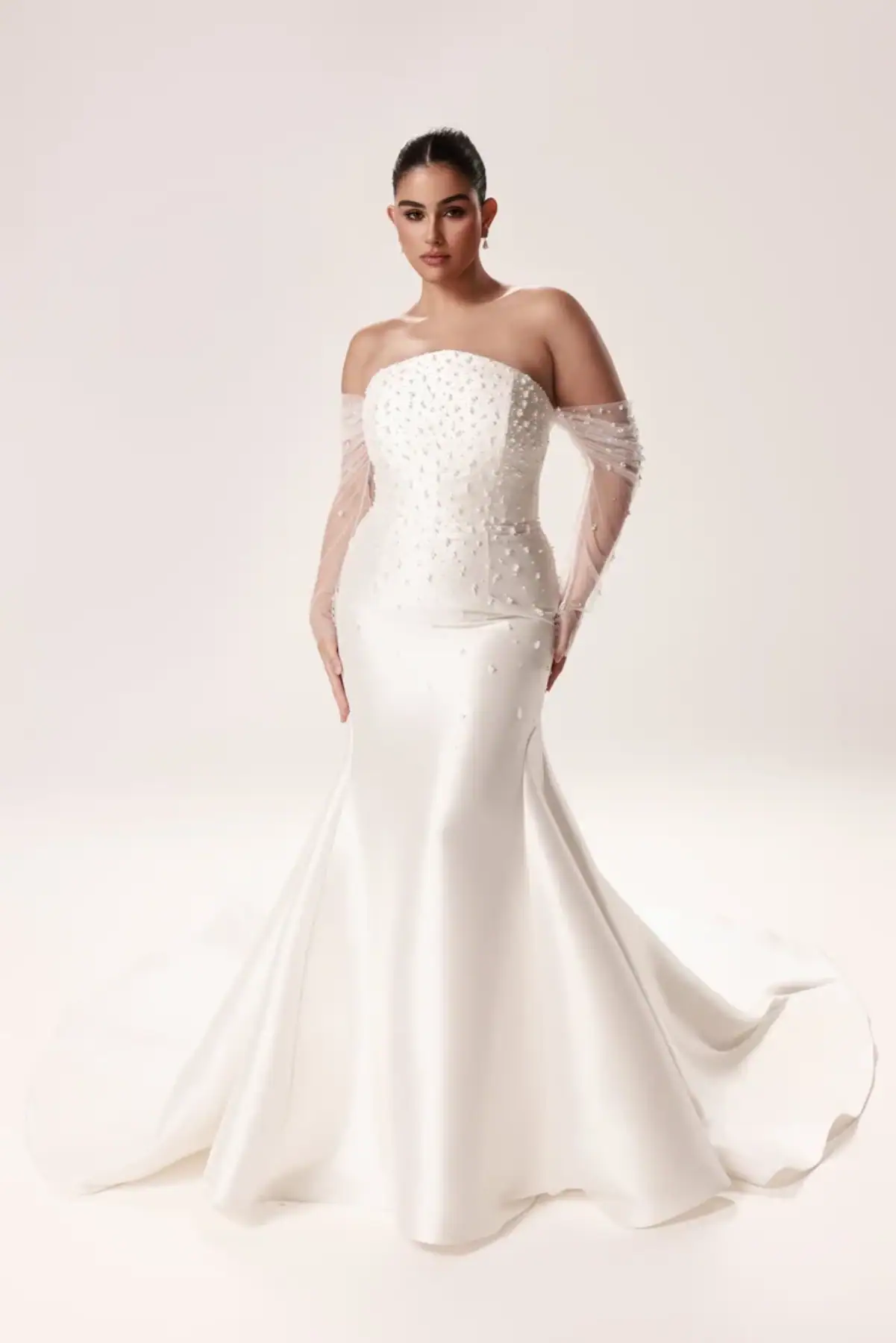 mikado fit n flare wedding dress with pointed neckline and matching sleeves