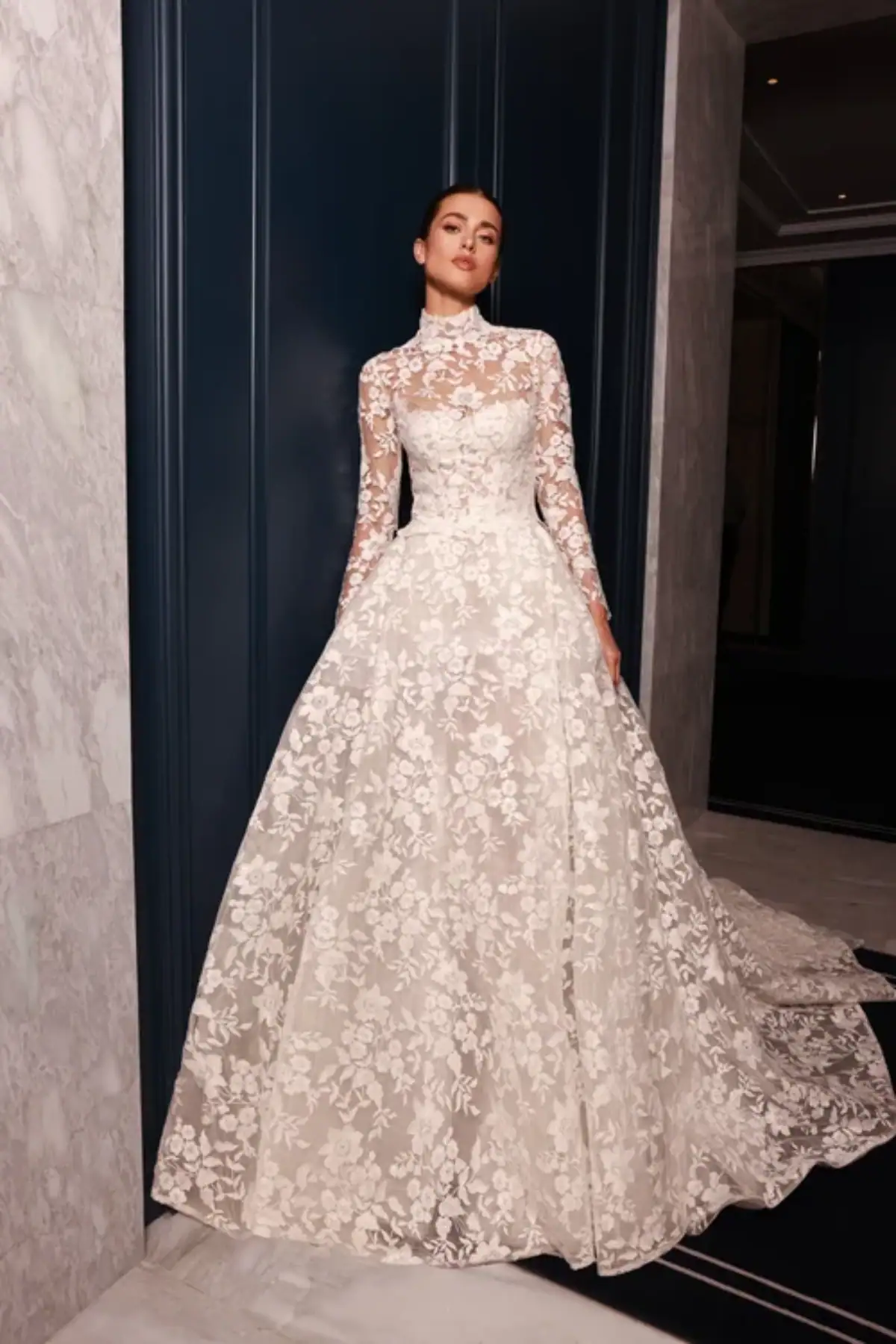 Lace ball gown wedding dress with high neckline and long sleeves