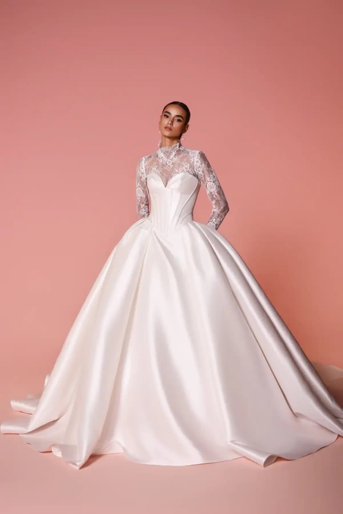 full front of dany tabet cedra ivory drop waist ball gown wedding dress with a matching long sleeve lace jacket
