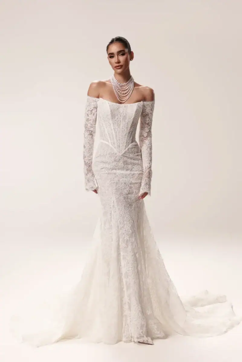 lace fit and flare wedding dress with basque waist and matching long sleeves