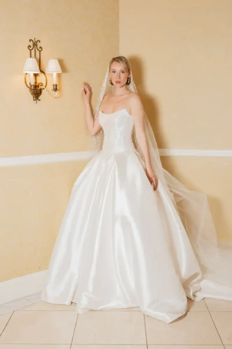 full front of dany tabet zariah ivory drop waist ball gown wedding dress with a scoop neckline and floral accents