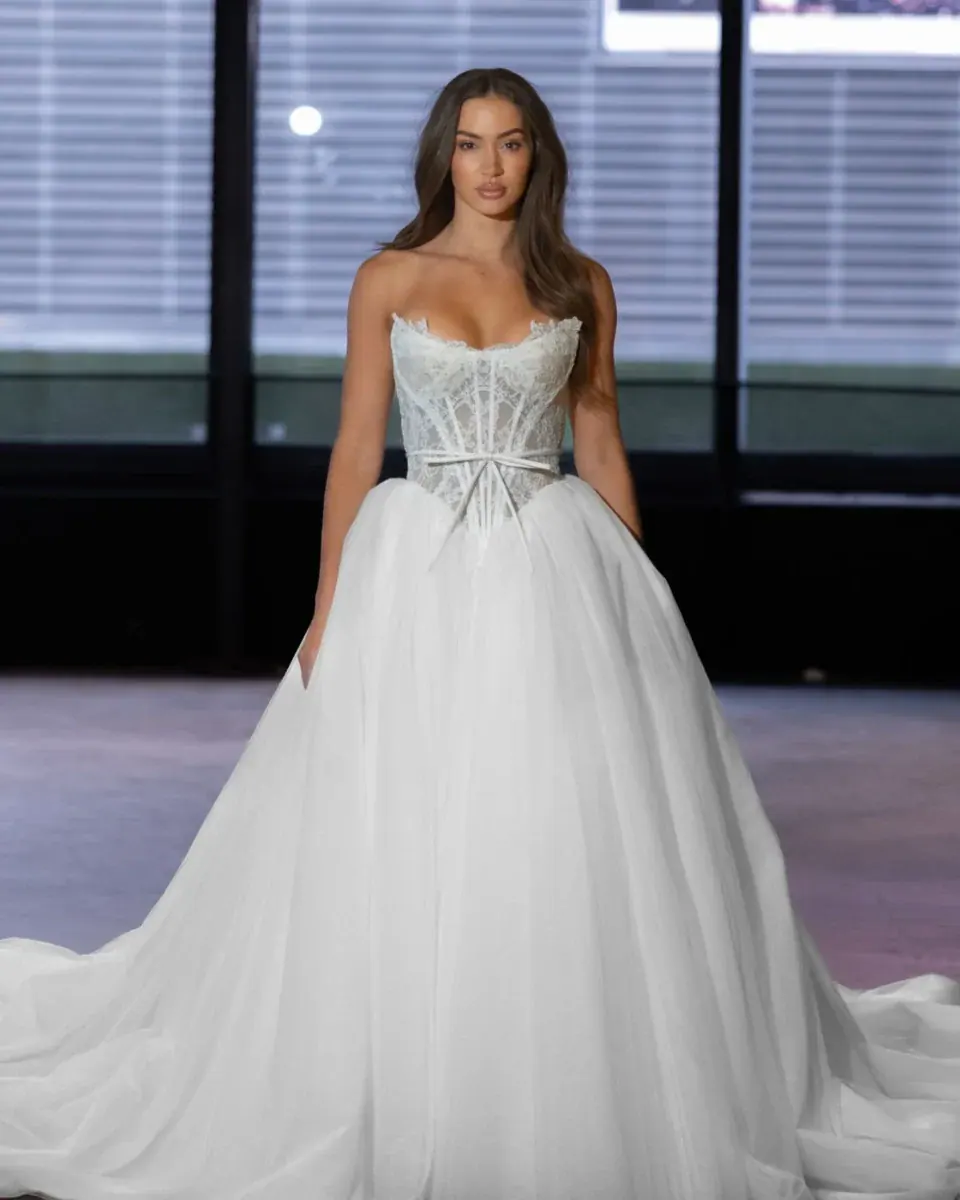 full front of hayley paige my carla ivory ball gown wedding dress with a basque waist and lace details on the bodice