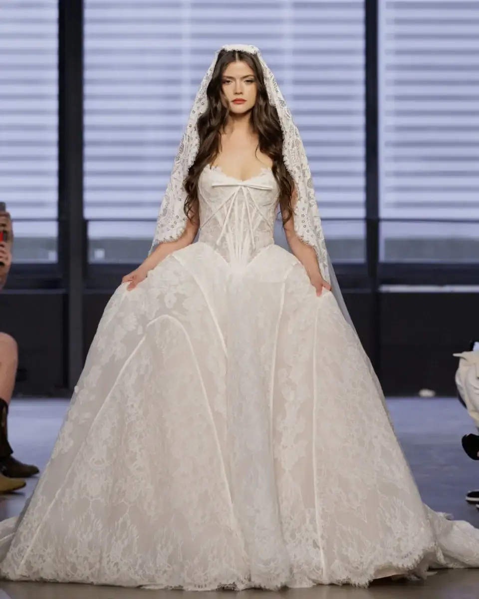 full front of hayley paige track 5 ivory tulle ball gown wedding dress with a basque waist and appliques throughout