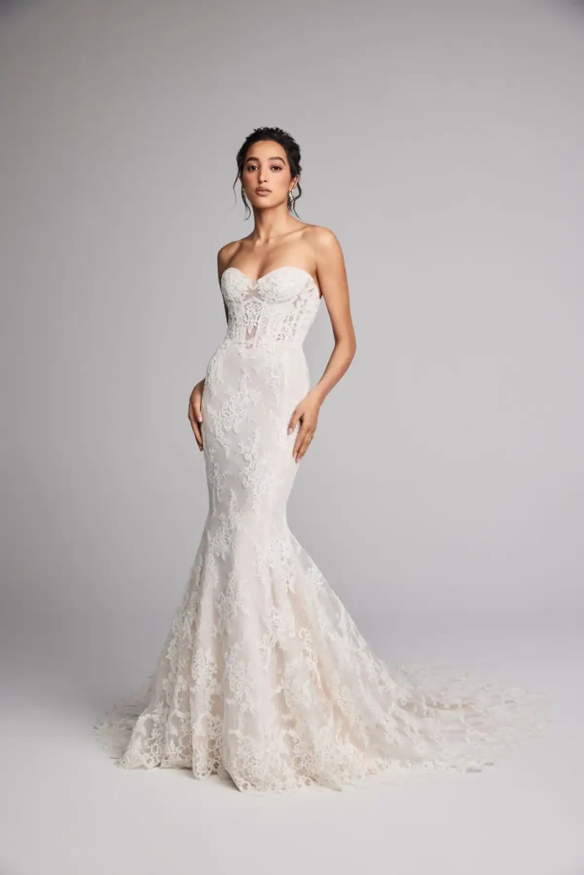 full front of ines di santo fleurine ivory lace fit and flare wedding dress with a strapless sweetheart neckline