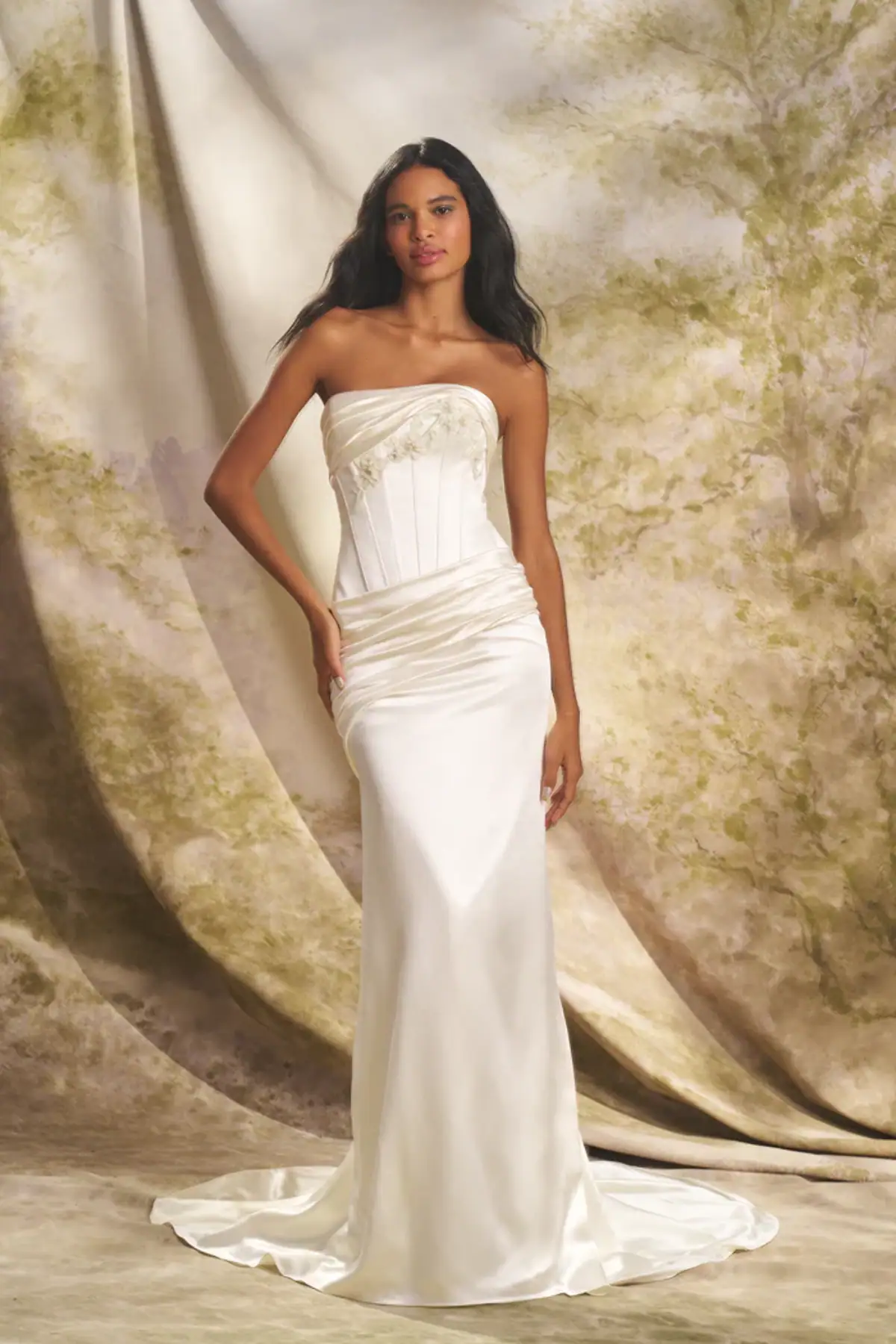 Silky fit and flare wedding dress with basque waist and draping