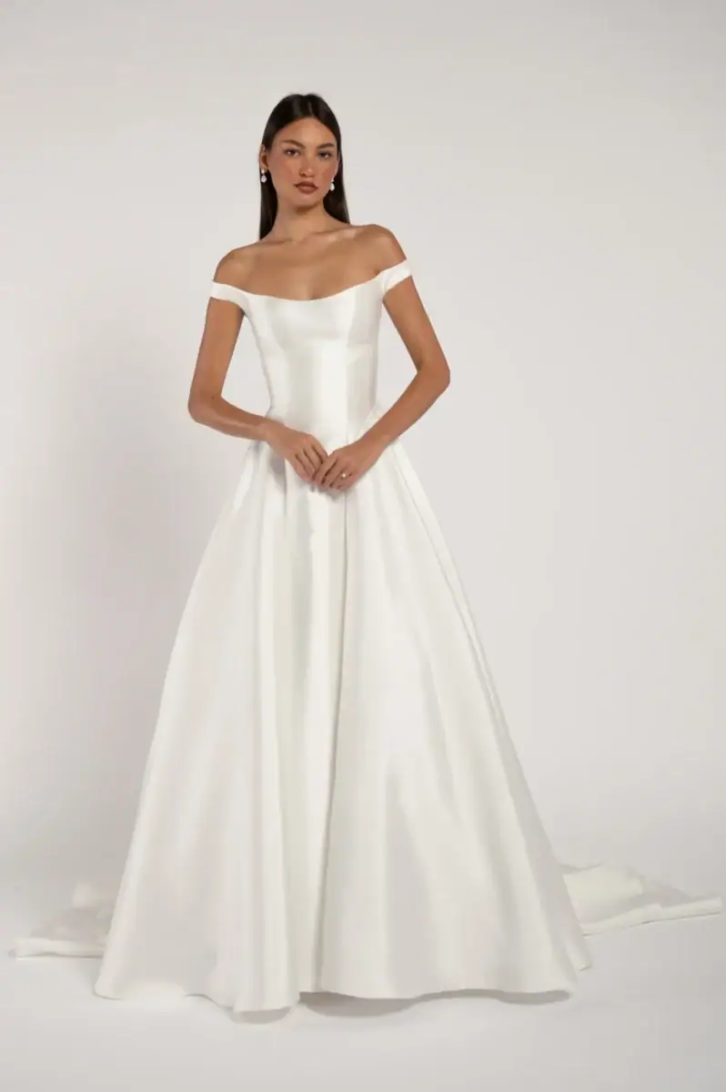 full front of jenny yoo alyne ivory mikado a-line wedding dress with an off the shoulder neckline