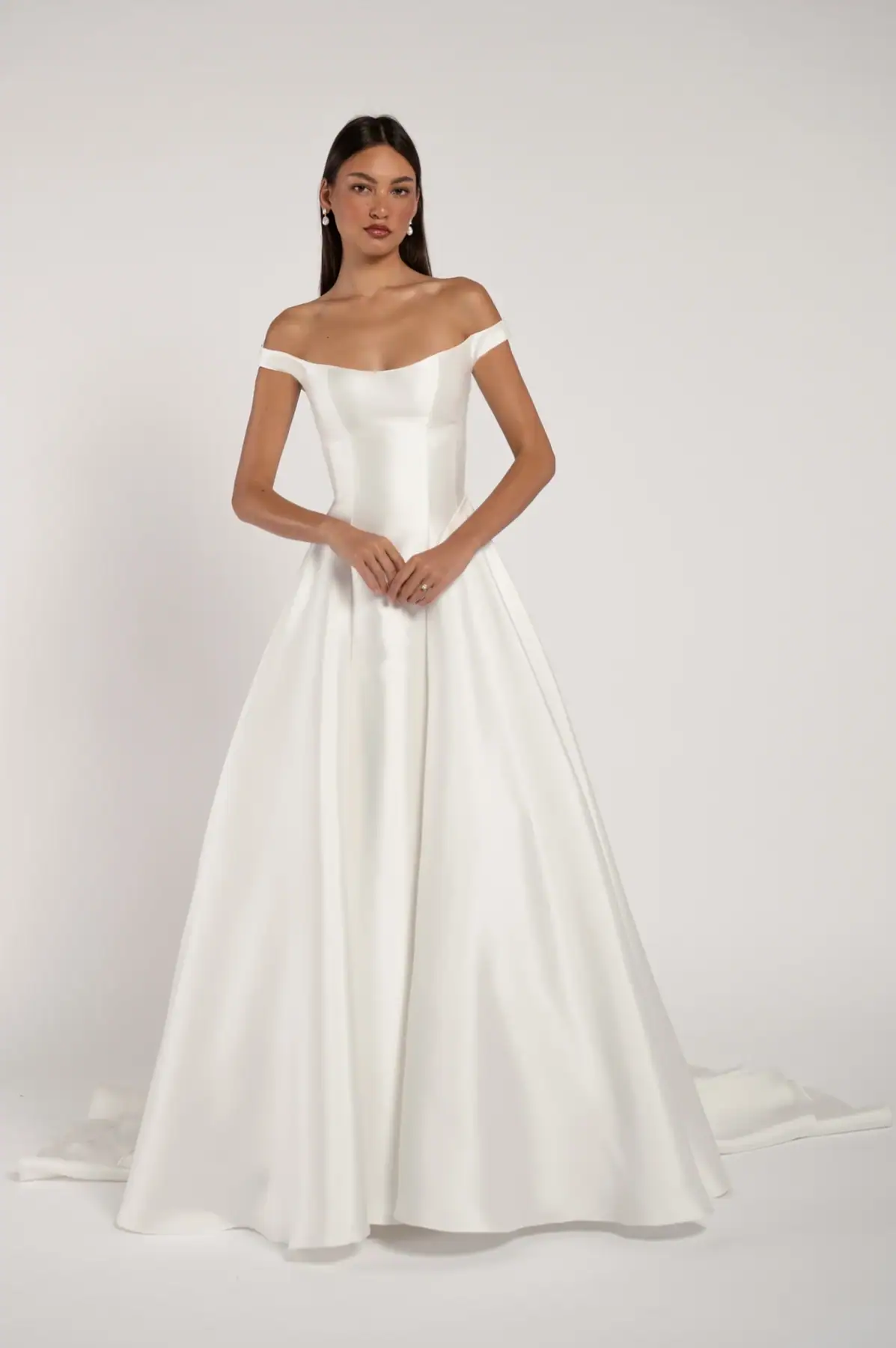 full front of jenny yoo alyne ivory mikado a-line wedding dress with an off the shoulder neckline