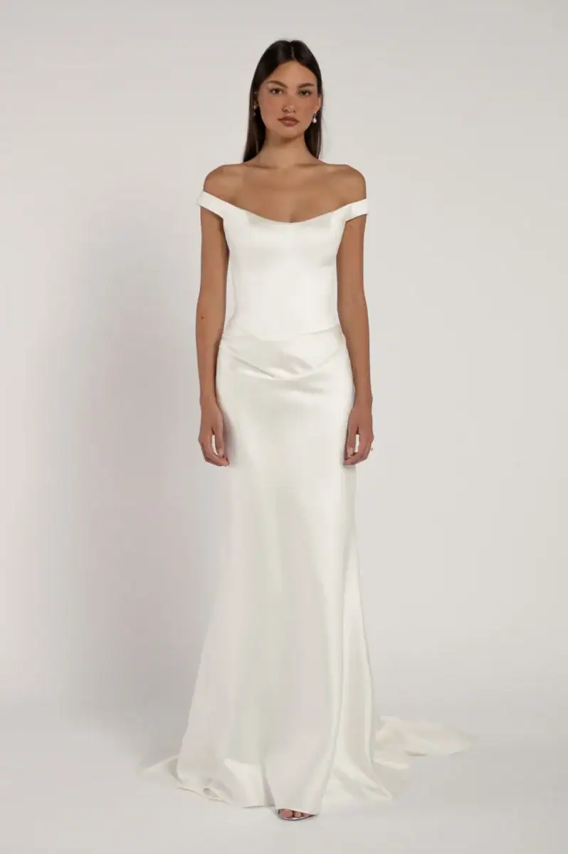 full front of jenny yoo elisa ivory fitted wedding dress with an off the shoulder neckline