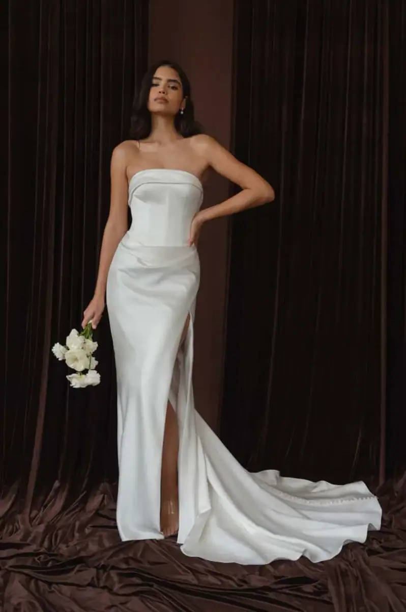jenny yoo silky sheath wedding dress with basque waist and slit in skirt