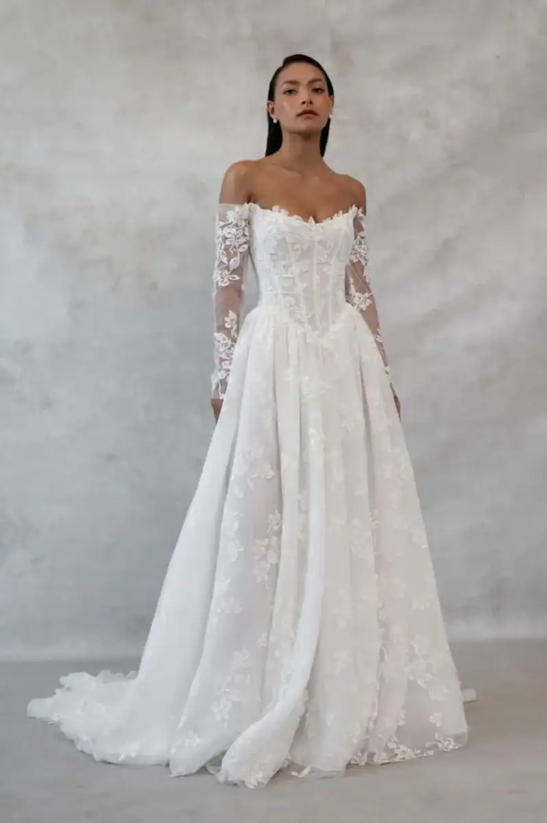 jenny yoo lace ball gown wedding dress with basque waist and long sleeves