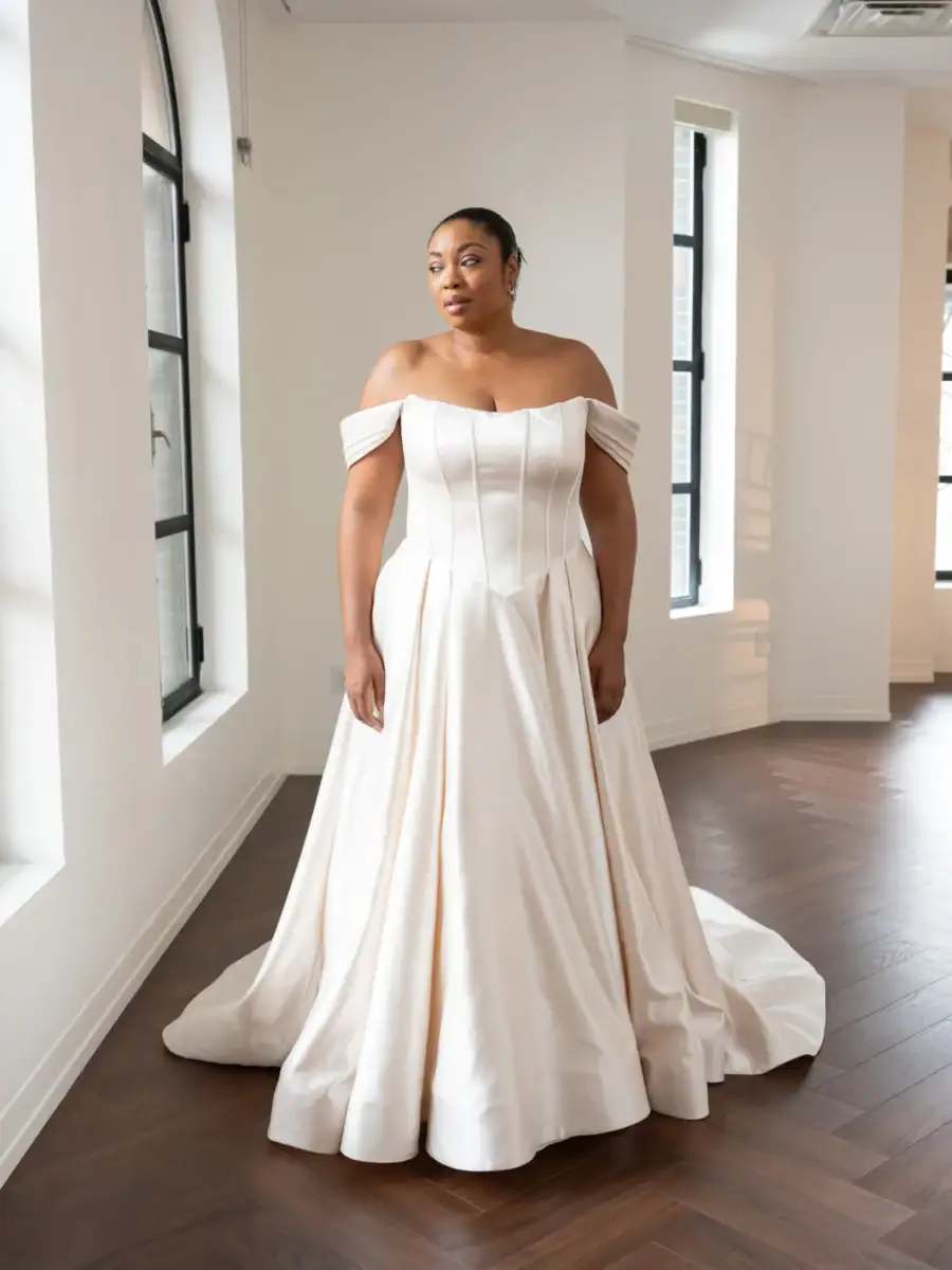 full front of kelly faetanini amelie ivory a-line wedding dress with a basque waist and off the shoulder straps