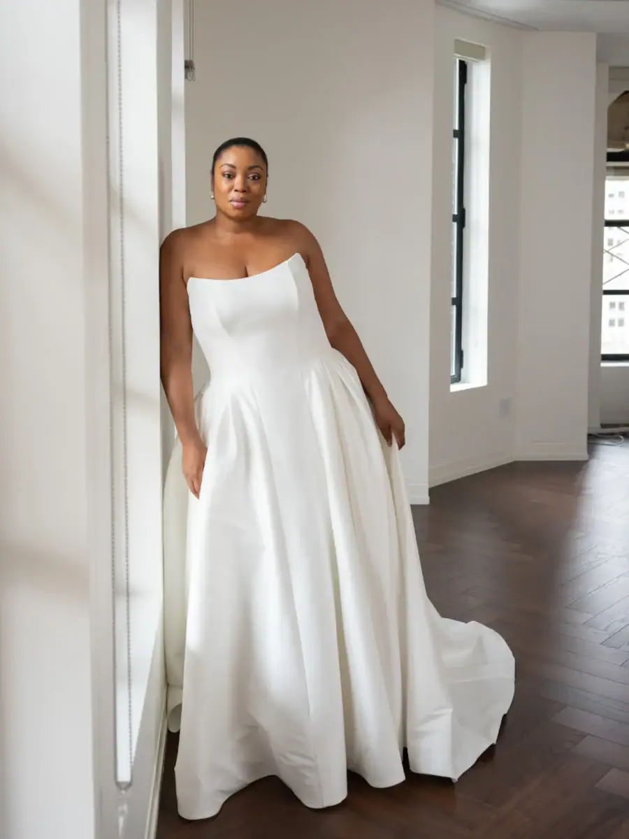full front of kelly faetanini calista ivory a-line wedding dress with a strapless scoop neckline