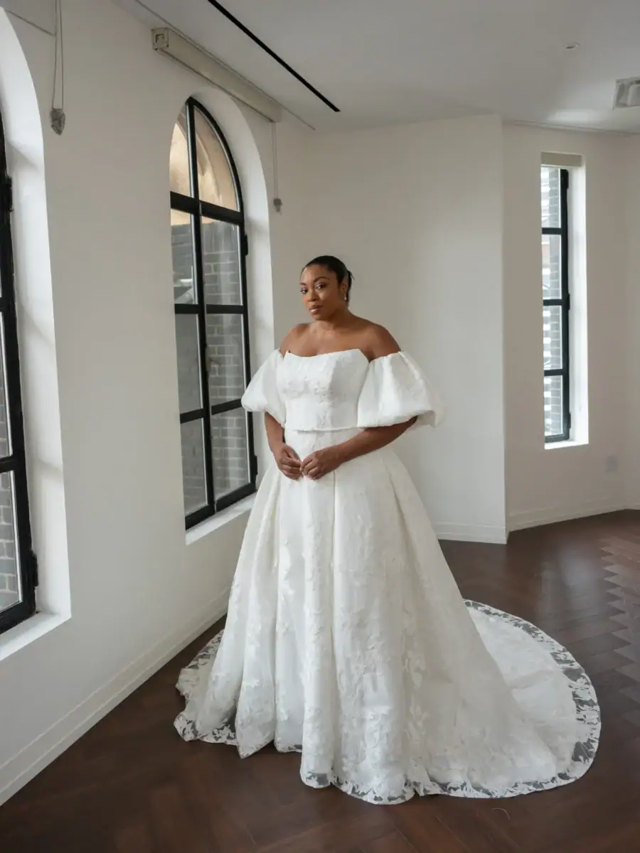 full front of kelly faetanini greer ivory a-line wedding dress with matching puffed sleeves