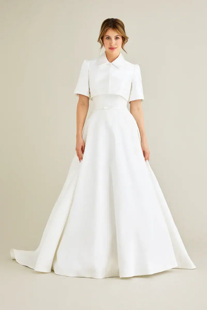 lea-ann belter ada mikado a-line wedding dress with matching jacket with short sleeves and a modest neckline