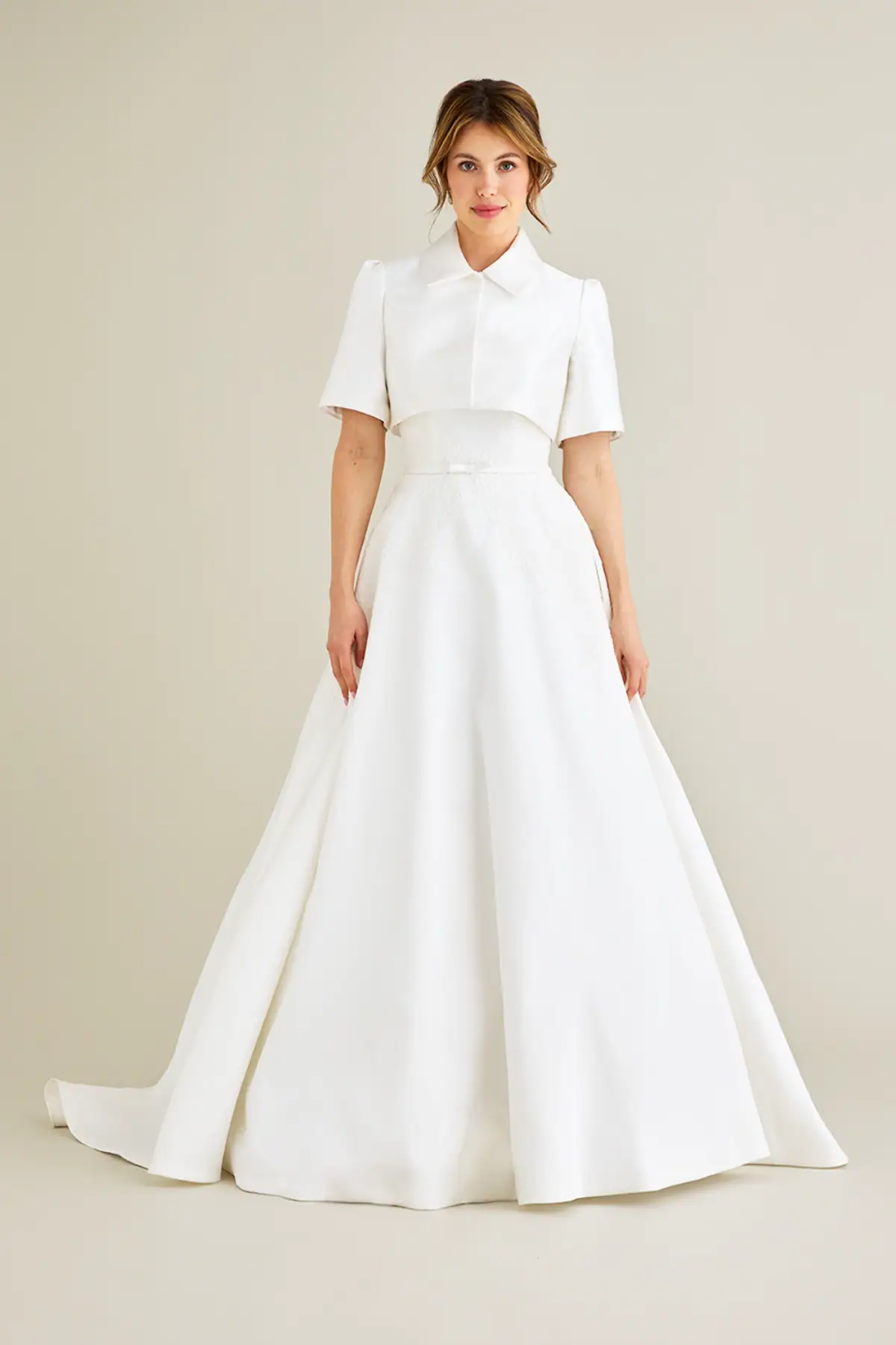 lea-ann belter ada mikado a-line wedding dress with matching jacket with short sleeves and a modest neckline