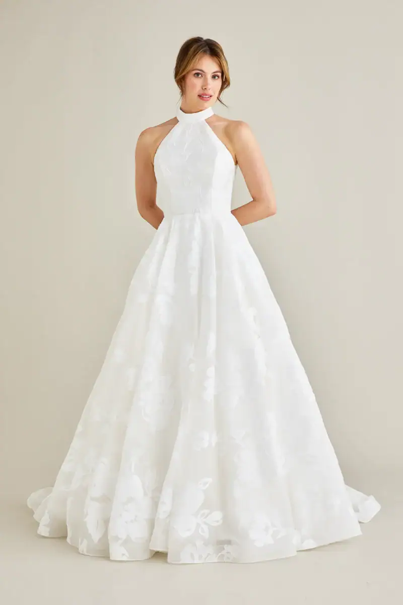lea-ann belter joan a-line tulle wedding dress with floral motifs throughout, and a halter neckline