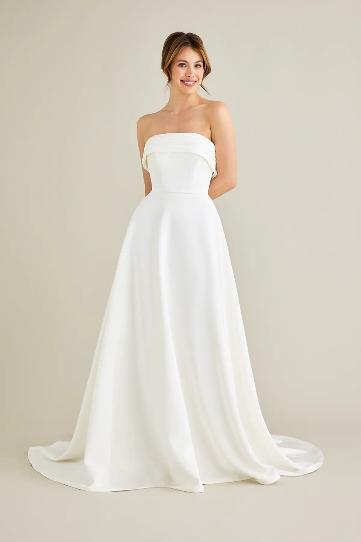 lea-ann belter pamela satin a-line wedding dress with cuff neckline on the strapless bodice and flowy skirt