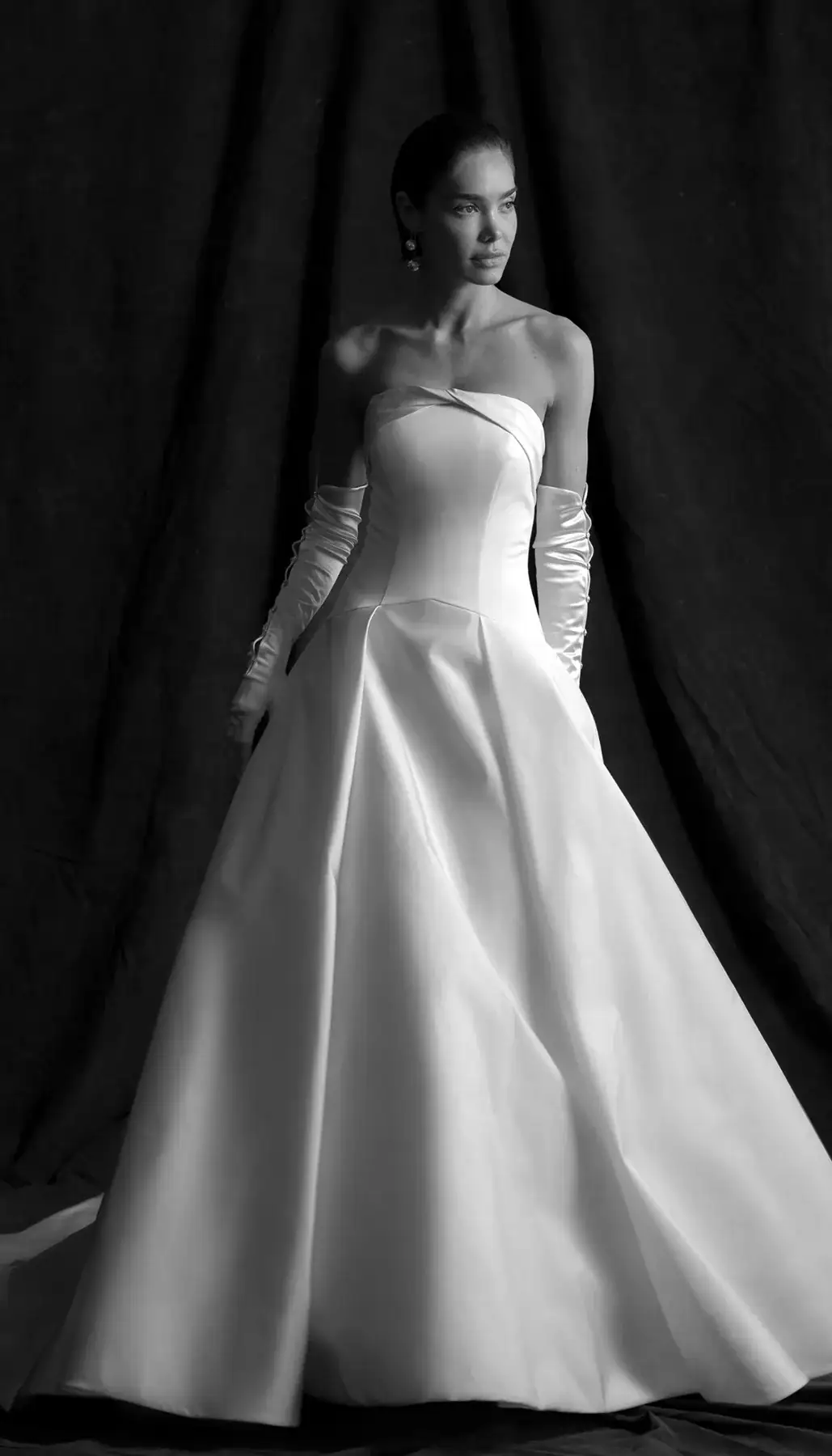 Basque waist wedding dress with strapless bodice