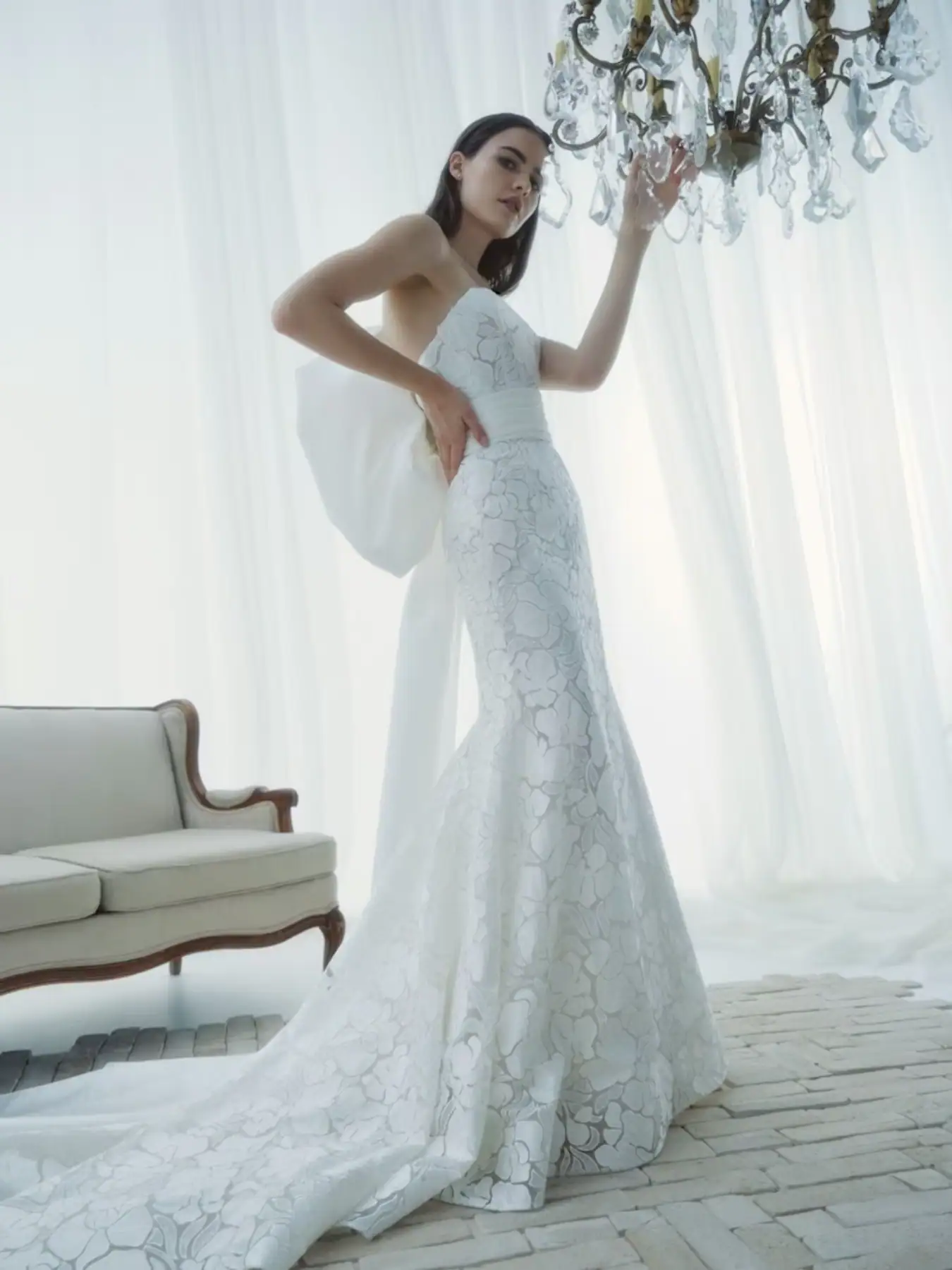 rivini lace fit and flare wedding dress with oversized bow