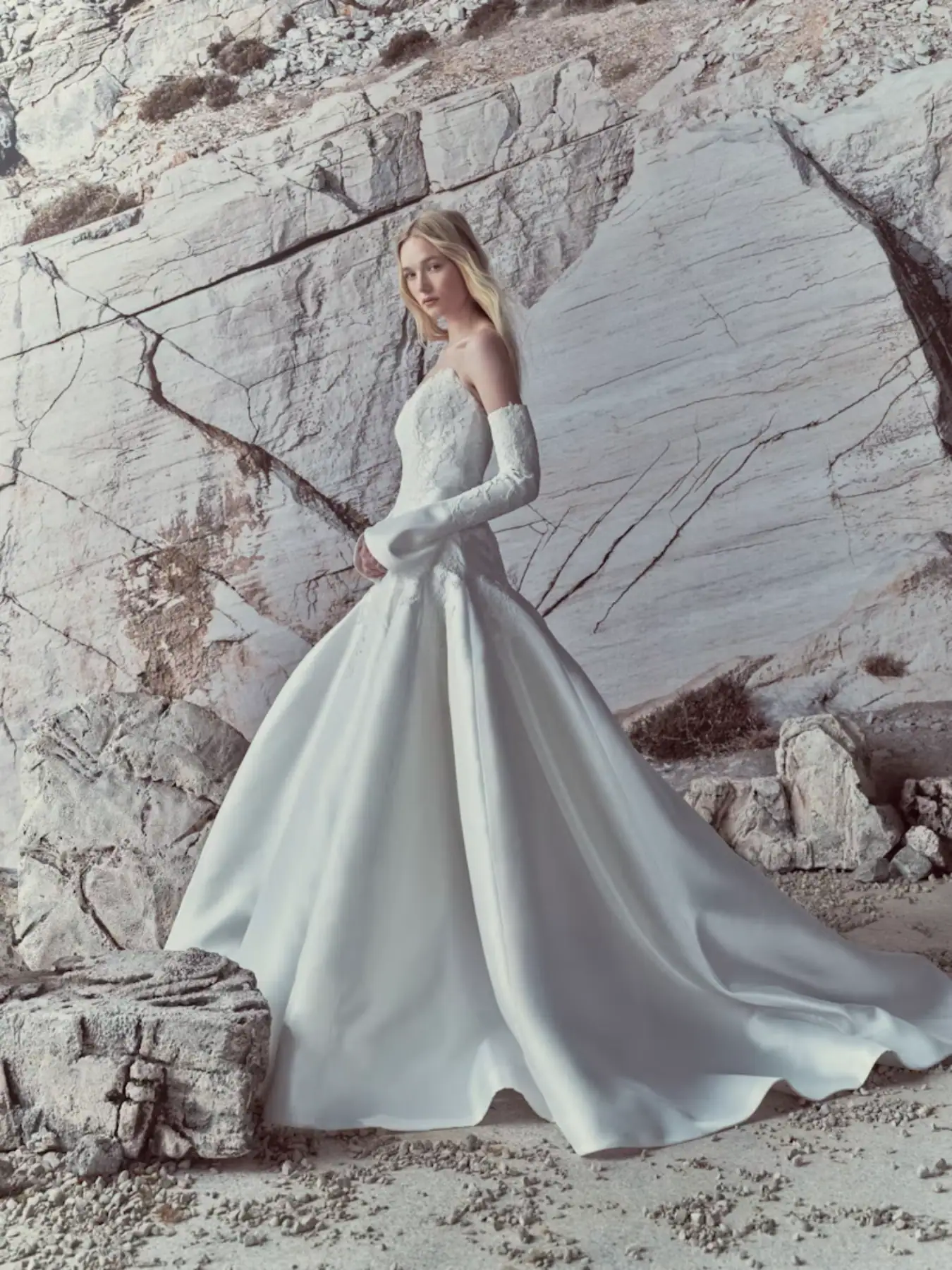 full ront of rivini luma ivory drop waist wedding dress with a lace bodice and matching long sleeves