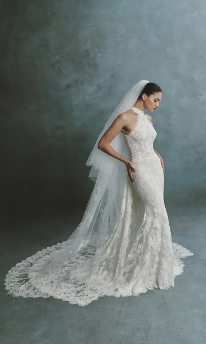 full front of senstudio se127 ivory lace fitted wedding dress with a halter neckline and matching lace train