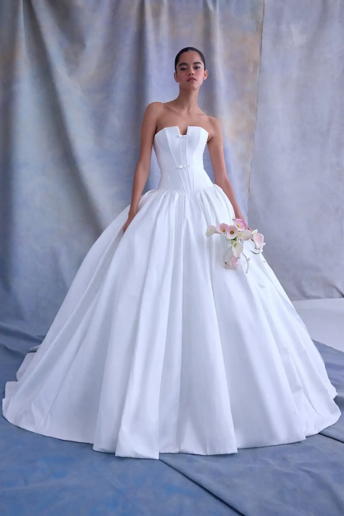 full front of veronica di santo calder ivory ball gown wedding dress with a drop waist and notched neckline
