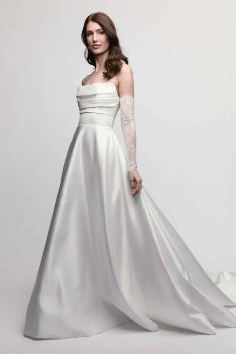 watters aster satin a-line wedding dress with strapless bodice and long lace sleeves