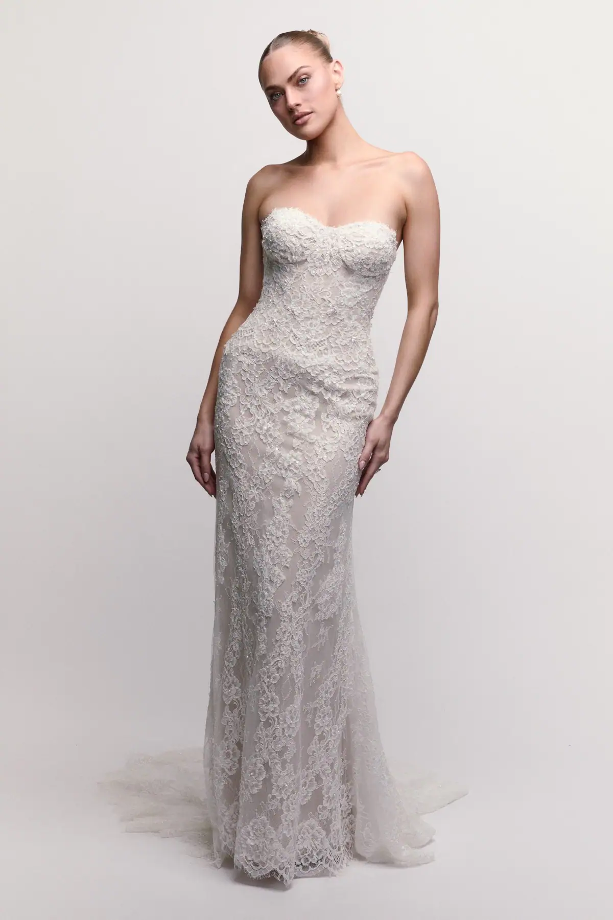 Lace sheath wedding dress with strapless sweetheart neckline
