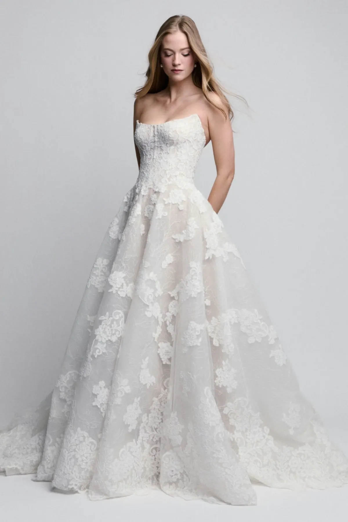 full front of watters jacqueline ivory tulle a-line wedding dress with oversized floral appliques and a strapless bodice