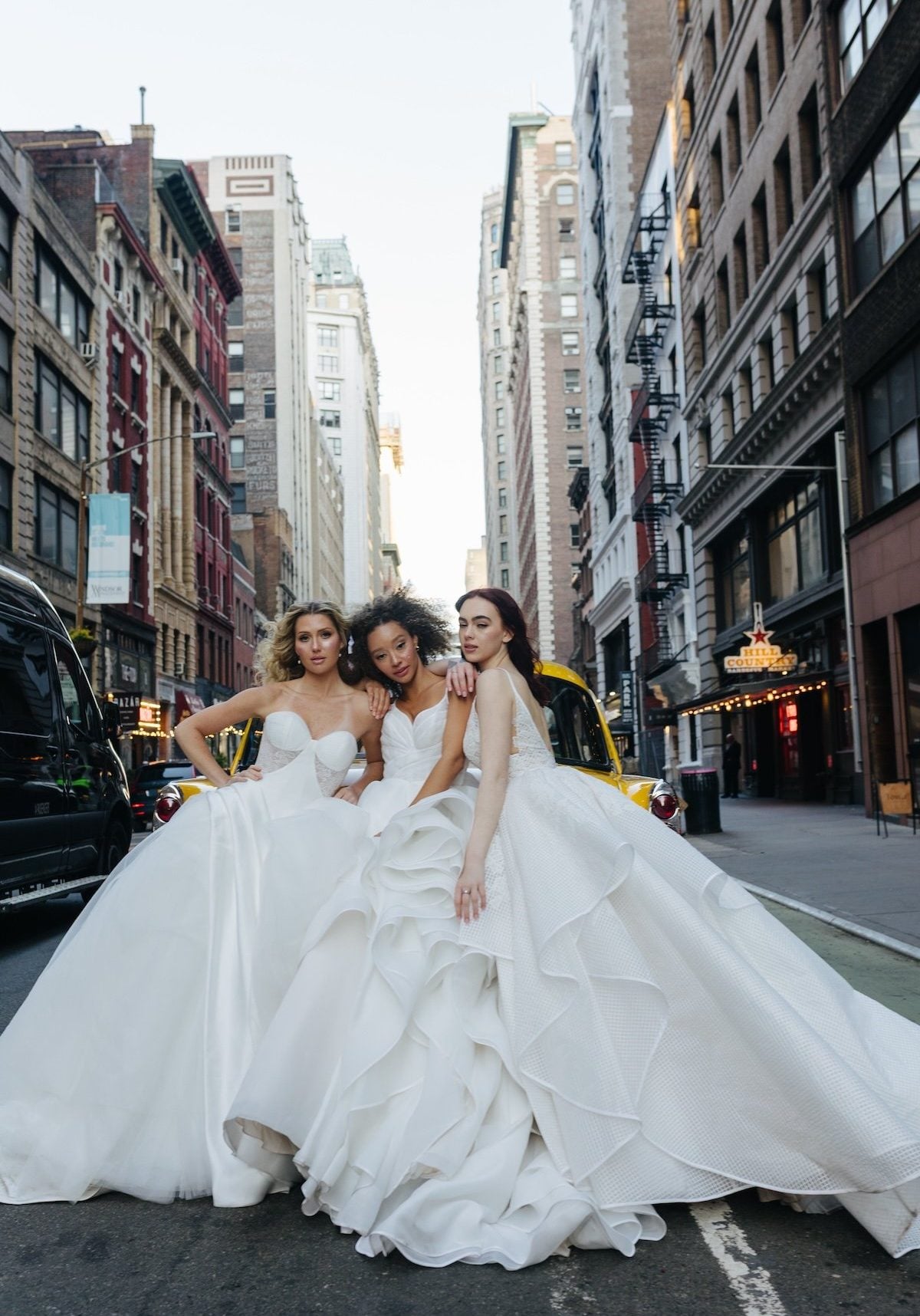 women in hayley paige wedding dresses