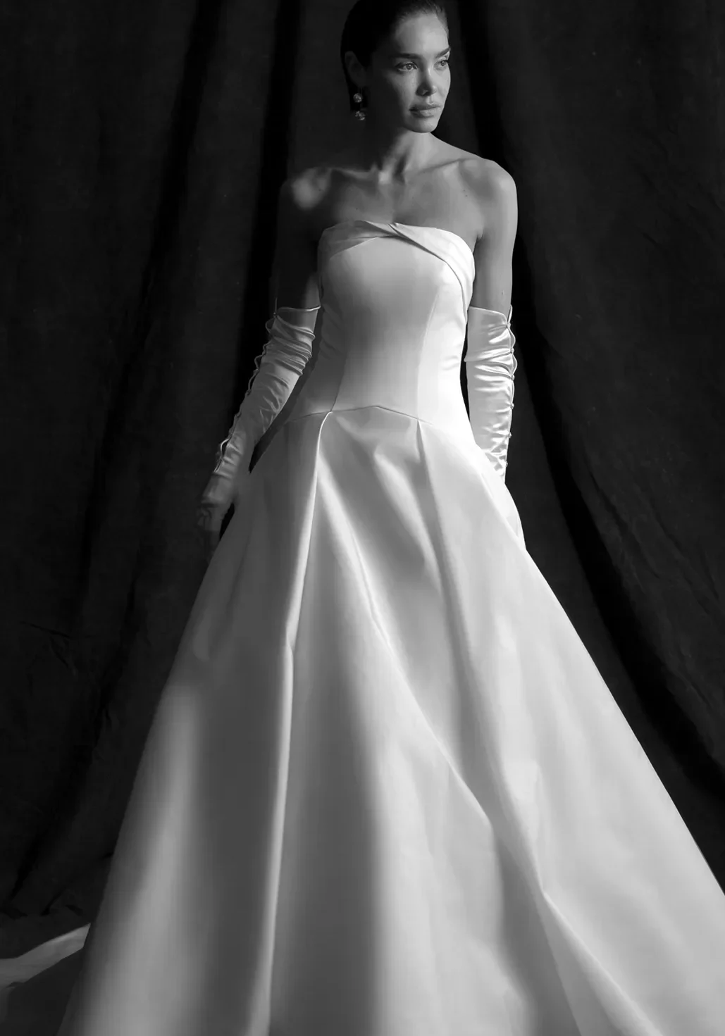 Basque waist wedding dress with strapless bodice